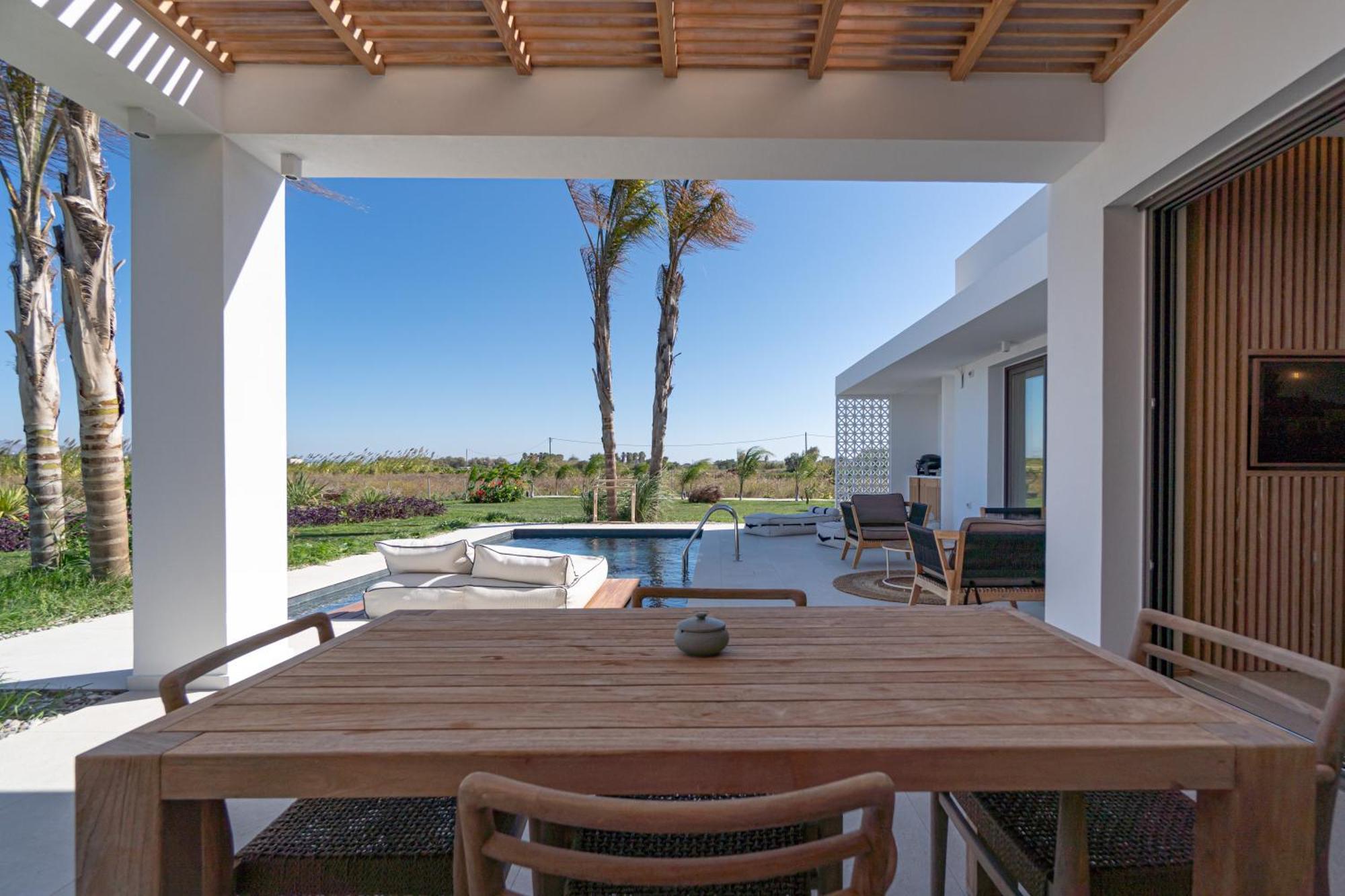 Taf Beach Villas With Tesla Τιγκάκι Δωμάτιο φωτογραφία
